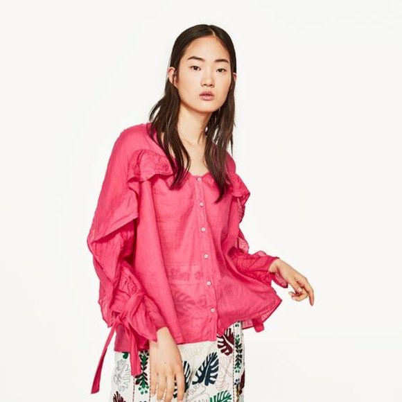 pink blouse with ruffles